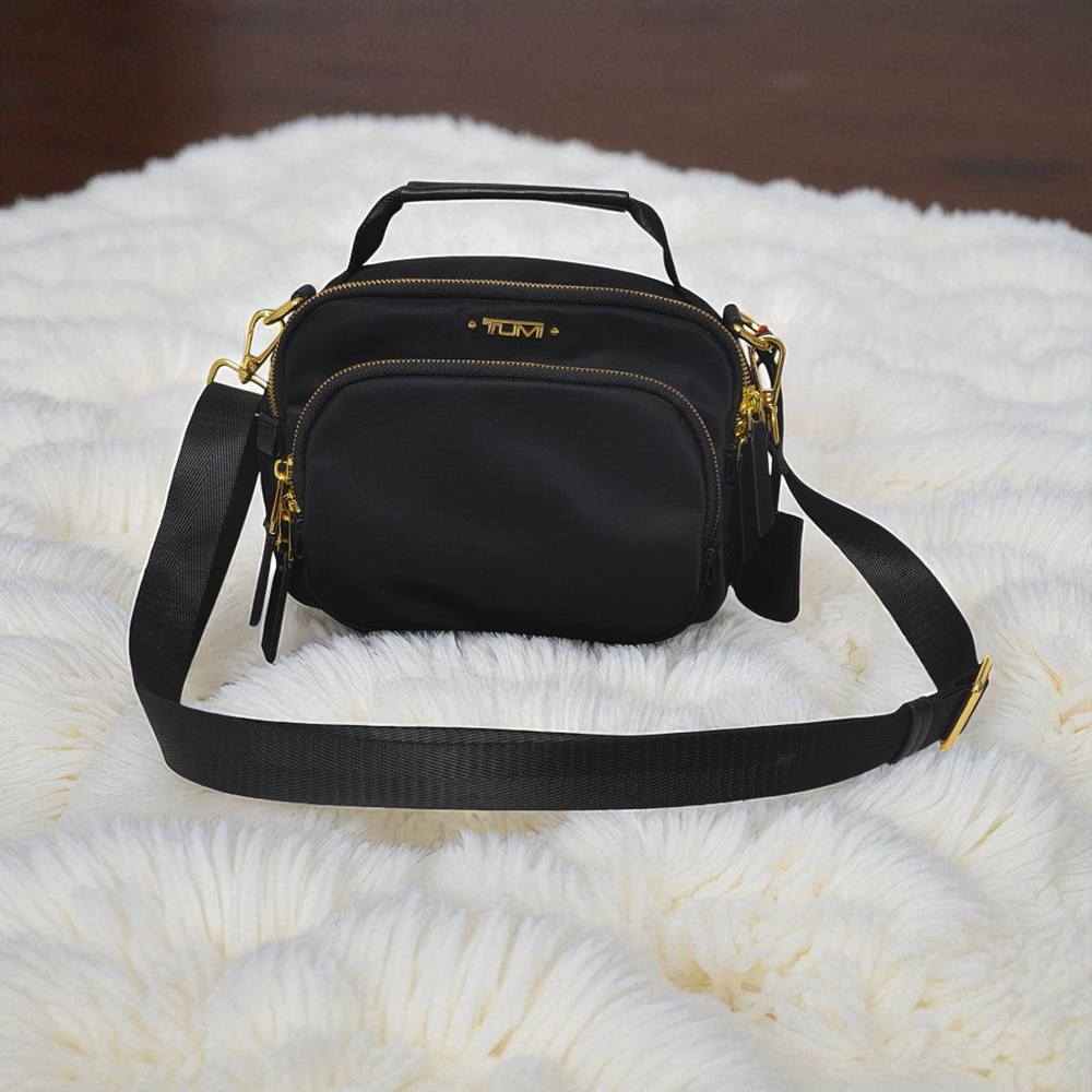 Tumi Elegant Black Crossbody with Gold Details